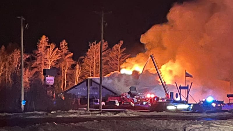 Firefighters battle a fire at Jake's Sales & Service in Beaver Feb. 10, 2022.