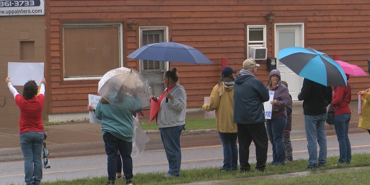 UPHS Nurses, Techs brave rain for practice strike in Marquette