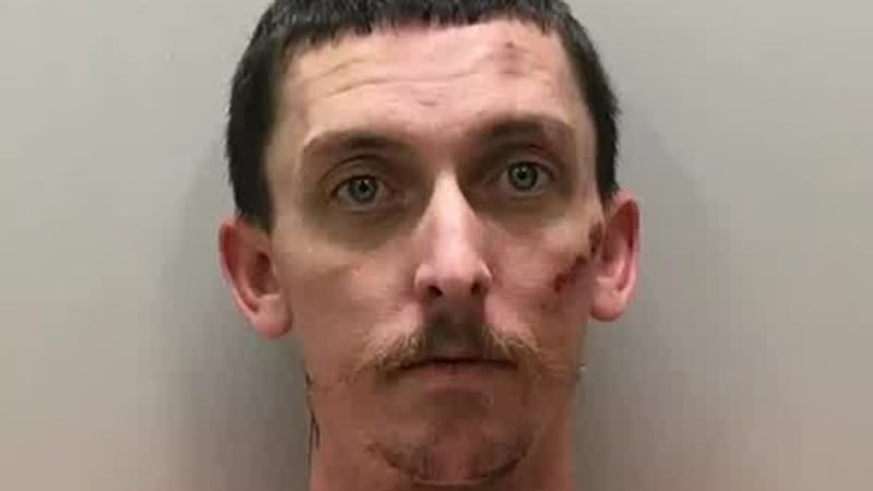 Lance Miller was arrested after police said a woman's body was found inside his vehicle after...