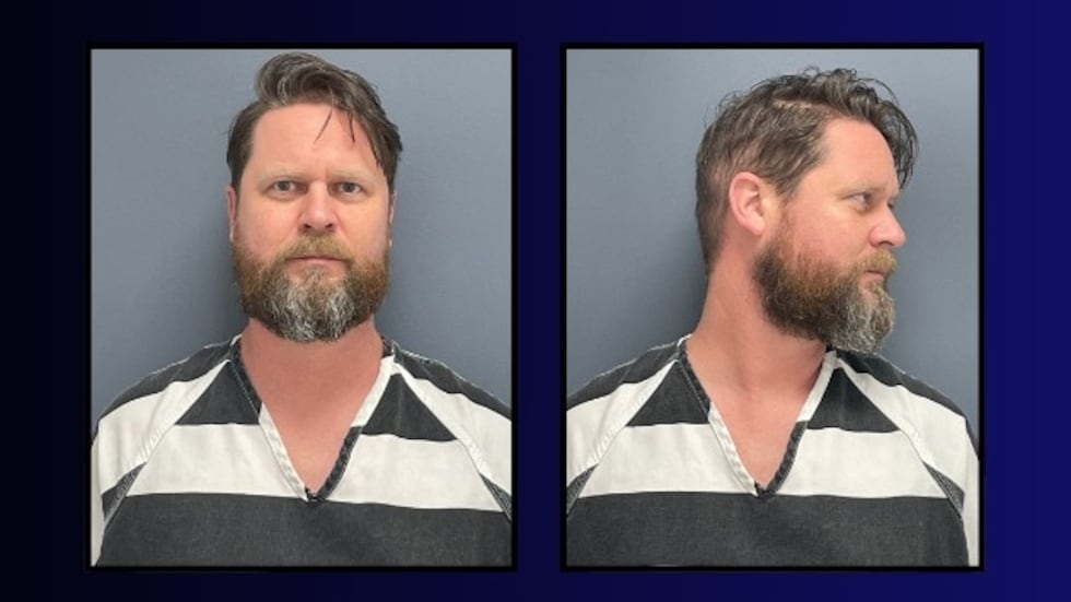 A man is accused of killing his ex-wife while her husband watched on security cameras.