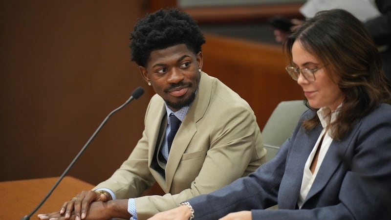FILE - Lil Nas X, whose legal name is Montero Lamar Hill, appears in court charged with four...