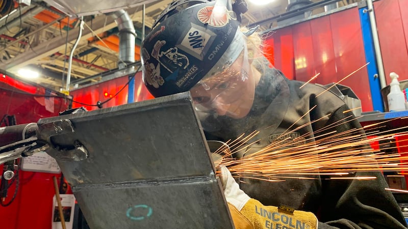 Student Mikala Sposito welds at Washtenaw Community College on Friday, May 1, 2026, in Ann...