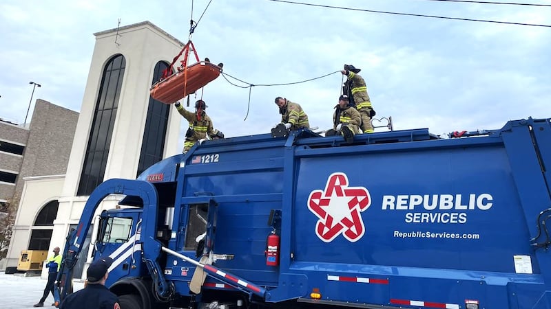 Refuse Rescue Cries for help lead rescue crews to person trapped in garbage truck